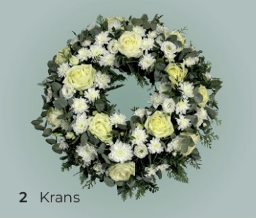 Hvite blomster i krans